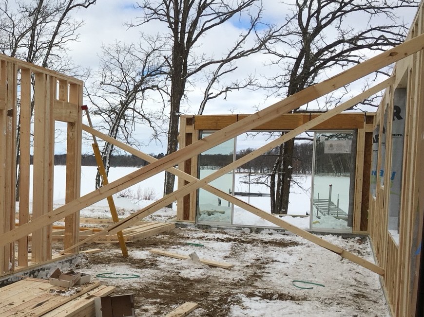 Framing with temporary diagonal braces; not a completed shear-wall detail.